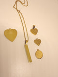 Collar con dije de acero inoxidable y oro de 18k